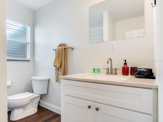 1243 55th Ave N, Saint Petersburg, FL 33703 - bathroom with vanity and wood finished floors