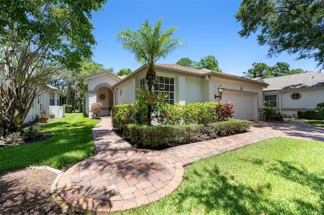 12209 Glencliff Cir, Tampa, FL 33626 - single story home with stucco siding, a garage, a front yard, and driveway