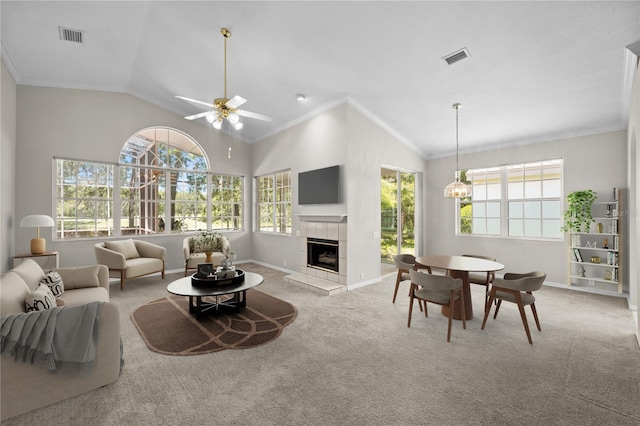12209 Glencliff Cir, Tampa, FL 33626 - living room featuring a fireplace, ceiling fan, carpet, high vaulted ceiling, and ornamental molding