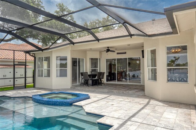 15012 Maurine Cove Ln, Odessa, FL 33556 - view of pool with a patio, ceiling fan, a pool with connected hot tub, and glass enclosure