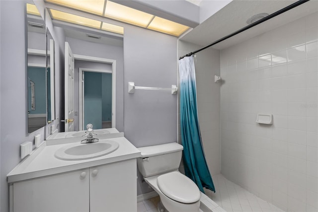 15012 Maurine Cove Ln, Odessa, FL 33556 - bathroom featuring tiled shower, vanity, and tile patterned flooring