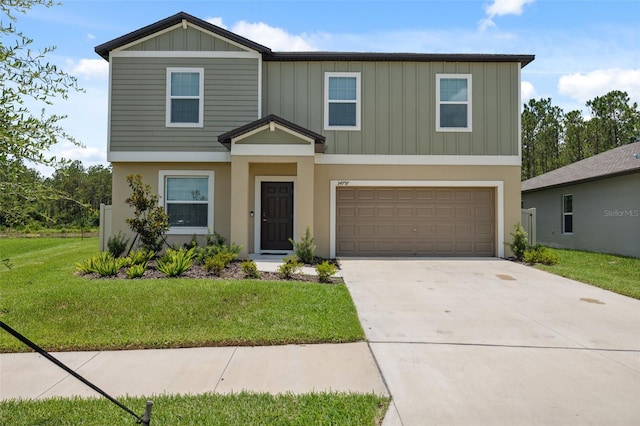 34797 Rainville Loop, Zephyrhills, FL 33541 - view of front of property with an attached garage, board and batten siding, driveway, a front yard, and stucco siding