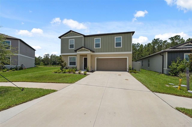 34797 Rainville Loop, Zephyrhills, FL 33541 - view of front facade featuring a garage, driveway, a front yard, and board and batten siding
