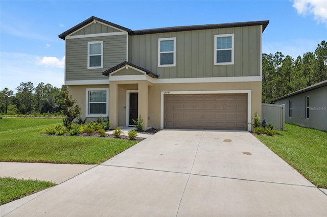 34797 Rainville Loop, Zephyrhills, FL 33541 - view of front facade with board and batten siding, concrete driveway, a garage, and a front yard