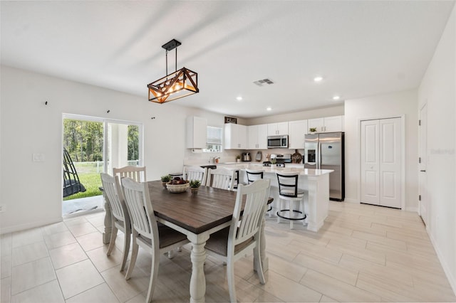 34797 Rainville Loop, Zephyrhills, FL 33541 - dining space with recessed lighting and baseboards