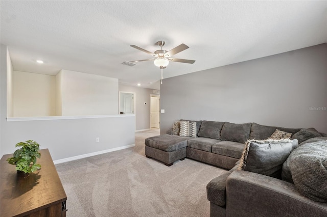 34797 Rainville Loop, Zephyrhills, FL 33541 - carpeted living room featuring ceiling fan, baseboards, and recessed lighting