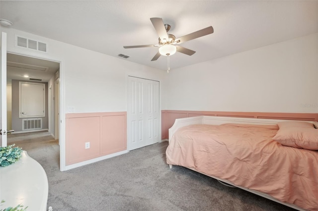 34797 Rainville Loop, Zephyrhills, FL 33541 - bedroom with carpet, a closet, and ceiling fan