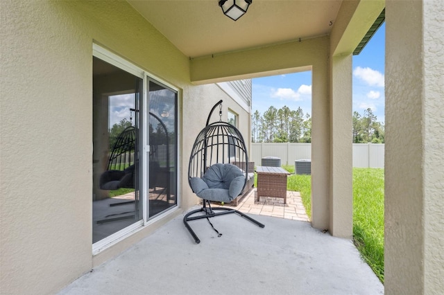34797 Rainville Loop, Zephyrhills, FL 33541 - view of patio / terrace with central AC unit