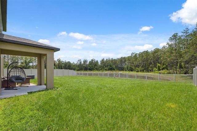 34797 Rainville Loop, Zephyrhills, FL 33541 - view of yard featuring a patio area