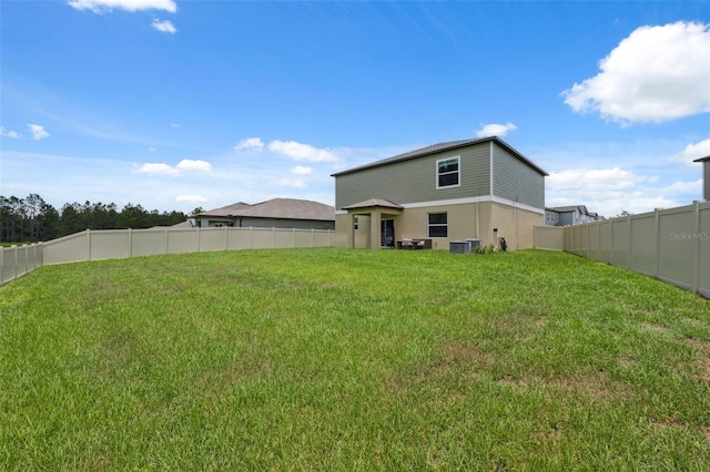 34797 Rainville Loop, Zephyrhills, FL 33541 - rear view of house featuring cooling unit