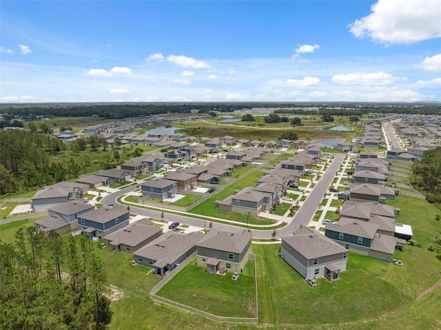 34797 Rainville Loop, Zephyrhills, FL 33541 - aerial overview of property's location featuring nearby suburban area and a nearby body of water