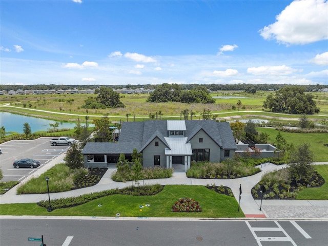 34797 Rainville Loop, Zephyrhills, FL 33541 - aerial view of property and surrounding area featuring a nearby body of water