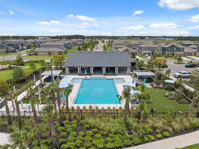 34797 Rainville Loop, Zephyrhills, FL 33541 - community pool with a residential view, a pergola, and a patio area