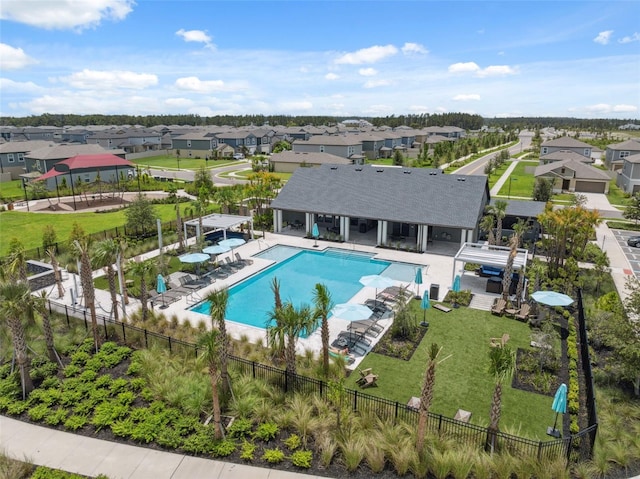 34797 Rainville Loop, Zephyrhills, FL 33541 - community pool featuring a residential view, a pergola, and a patio