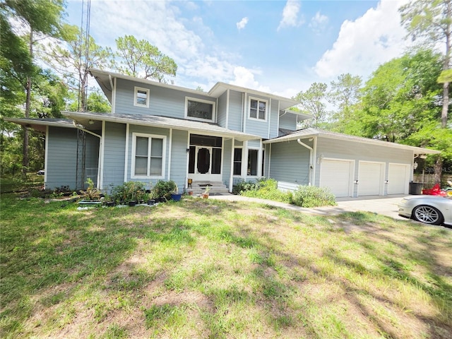 2975 E Withlacoochee Trl, Dunnellon, FL 34434 - view of front facade featuring a garage, a front yard, and driveway