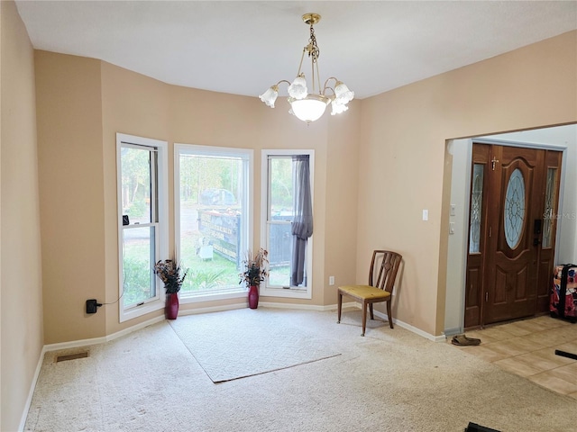 2975 E Withlacoochee Trl, Dunnellon, FL 34434 - foyer entrance with carpet floors and a chandelier
