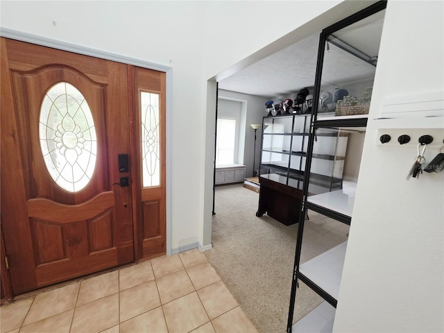 2975 E Withlacoochee Trl, Dunnellon, FL 34434 - tiled foyer with carpet flooring and baseboards