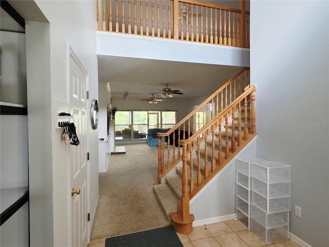 2975 E Withlacoochee Trl, Dunnellon, FL 34434 - stairway featuring ceiling fan and carpet