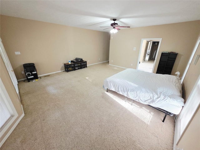 2975 E Withlacoochee Trl, Dunnellon, FL 34434 - carpeted bedroom featuring baseboards and ceiling fan