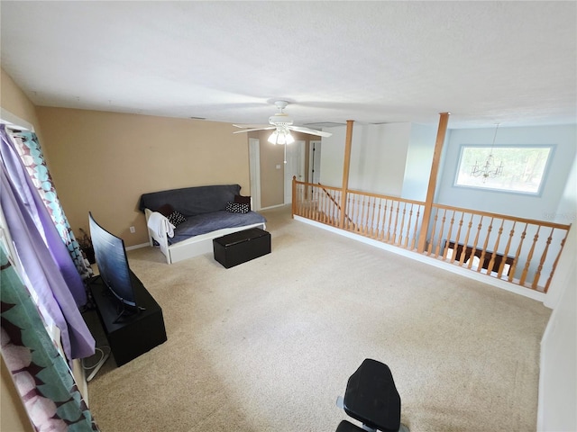 2975 E Withlacoochee Trl, Dunnellon, FL 34434 - living area featuring carpet flooring and a ceiling fan