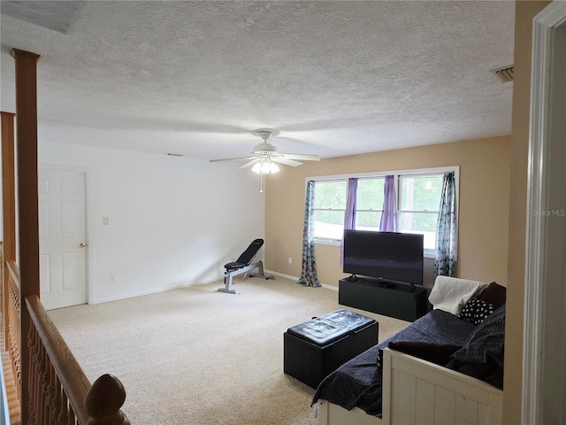 2975 E Withlacoochee Trl, Dunnellon, FL 34434 - carpeted living room with ceiling fan and a textured ceiling