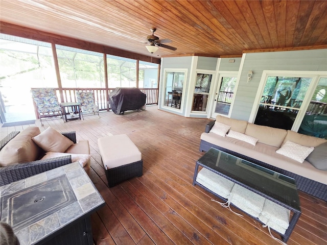 2975 E Withlacoochee Trl, Dunnellon, FL 34434 - sunroom / solarium with an outdoor hangout area, a ceiling fan, and healthy amount of natural light