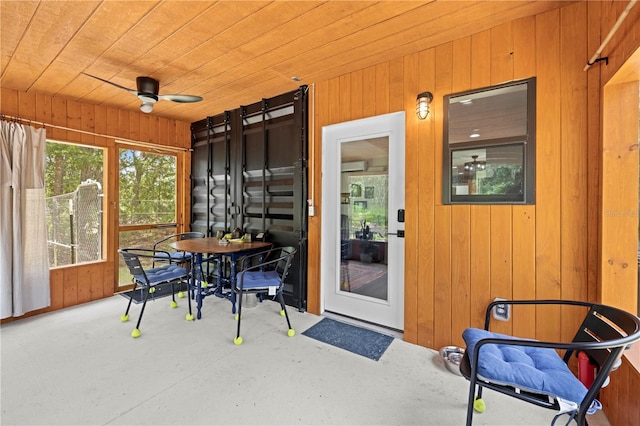 7013 W Polaris Ct, Homosassa, FL 34446 - entrance to property featuring ceiling fan, outdoor dining space, a patio, and an AC wall unit