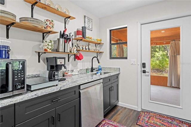 7013 W Polaris Ct, Homosassa, FL 34446 - indoor wet bar featuring appliances with stainless steel finishes and dark wood-style floors
