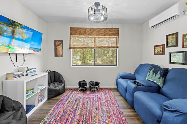 7013 W Polaris Ct, Homosassa, FL 34446 - living room featuring a wall unit AC, wood finished floors, and a chandelier