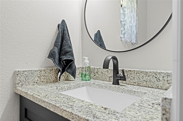 7013 W Polaris Ct, Homosassa, FL 34446 - bathroom featuring vanity and a textured wall