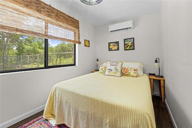 7013 W Polaris Ct, Homosassa, FL 34446 - bedroom featuring a wall mounted AC and wood finished floors