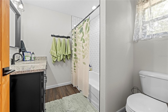 7013 W Polaris Ct, Homosassa, FL 34446 - full bath with vanity, wood finished floors, and shower / bathtub combination with curtain