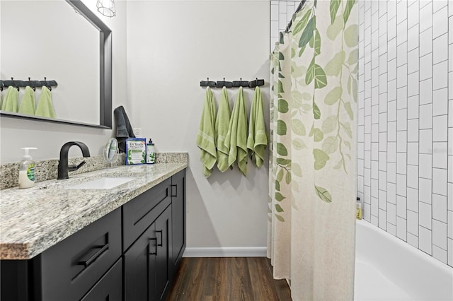 7013 W Polaris Ct, Homosassa, FL 34446 - full bathroom featuring vanity, wood finished floors, and shower / bath combo