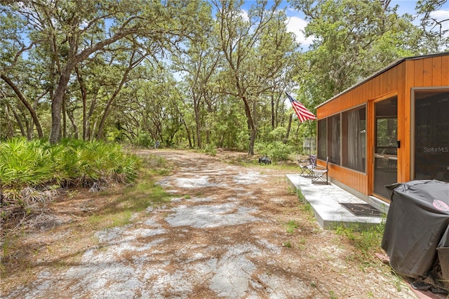 7013 W Polaris Ct, Homosassa, FL 34446 - view of yard with a sunroom
