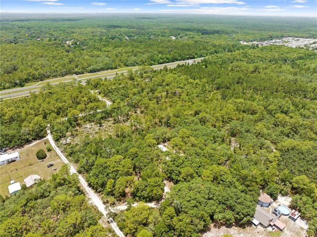 7013 W Polaris Ct, Homosassa, FL 34446 - aerial view of property and surrounding area with a forest