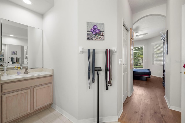 19104 Cellini Pl, Lutz, FL 33558 - bathroom featuring vanity and wood finished floors
