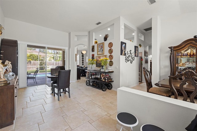 19104 Cellini Pl, Lutz, FL 33558 - dining area featuring light stone finish floors