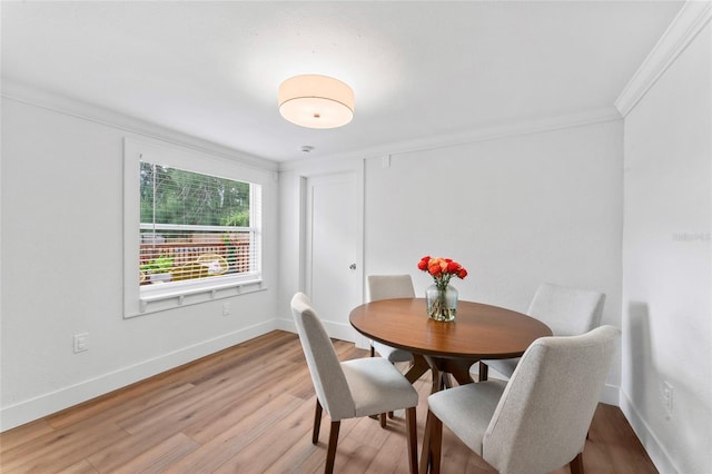 9000 Bay St NE, Saint Petersburg, FL 33702 - dining area with ornamental molding, wood finished floors, and baseboards