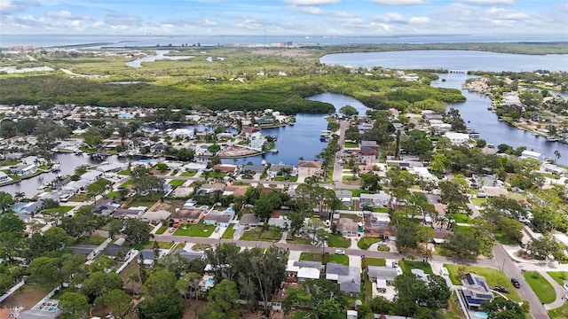 9000 Bay St NE, Saint Petersburg, FL 33702 - aerial view of property and surrounding area featuring a large body of water, nearby suburban area, and a notable bridge