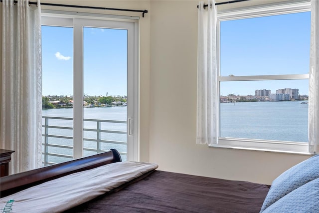 7932 Sailboat Key Blvd S Unit 406, South Pasadena, FL 33707 - bedroom with a water view and multiple windows