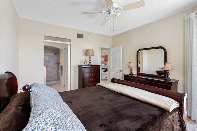 7932 Sailboat Key Blvd S Unit 406, South Pasadena, FL 33707 - bedroom with ceiling fan, connected bathroom, and arched walkways