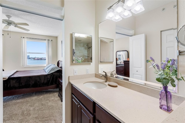 7932 Sailboat Key Blvd S Unit 406, South Pasadena, FL 33707 - ensuite bathroom with vanity, a ceiling fan, a chandelier, and a shower