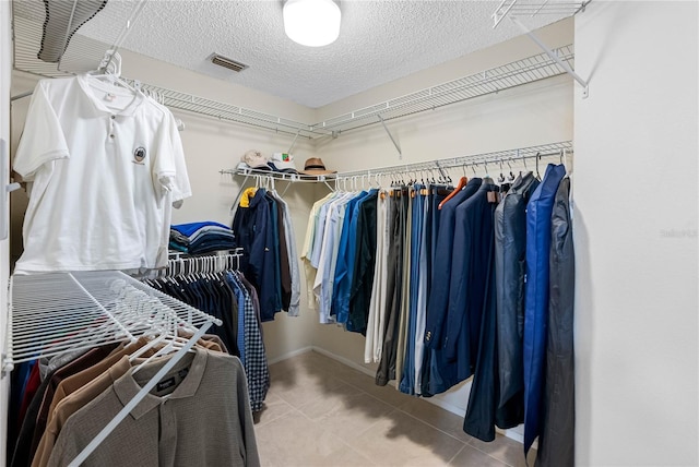 7932 Sailboat Key Blvd S Unit 406, South Pasadena, FL 33707 - spacious closet with tile patterned flooring