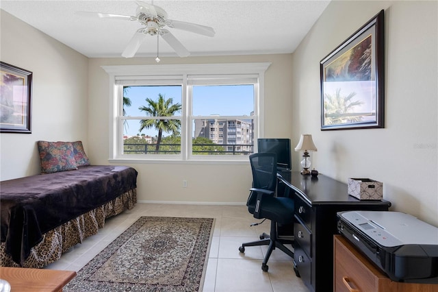 7932 Sailboat Key Blvd S Unit 406, South Pasadena, FL 33707 - office space featuring light tile patterned floors, a ceiling fan, and a textured ceiling