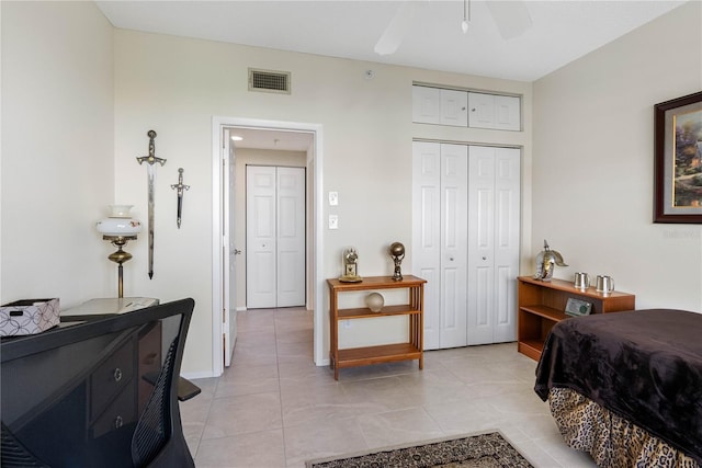7932 Sailboat Key Blvd S Unit 406, South Pasadena, FL 33707 - bedroom featuring a closet, light tile patterned flooring, and ceiling fan