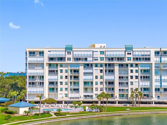 7932 Sailboat Key Blvd S Unit 406, South Pasadena, FL 33707 - view of apartment building / complex featuring a community pool and a water view