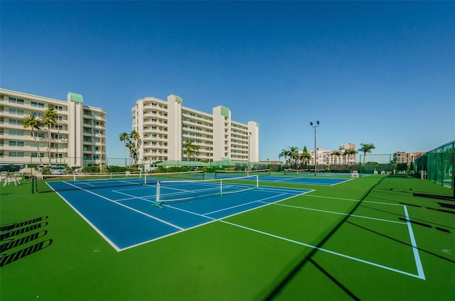 7932 Sailboat Key Blvd S Unit 406, South Pasadena, FL 33707 - view of tennis court with community basketball court