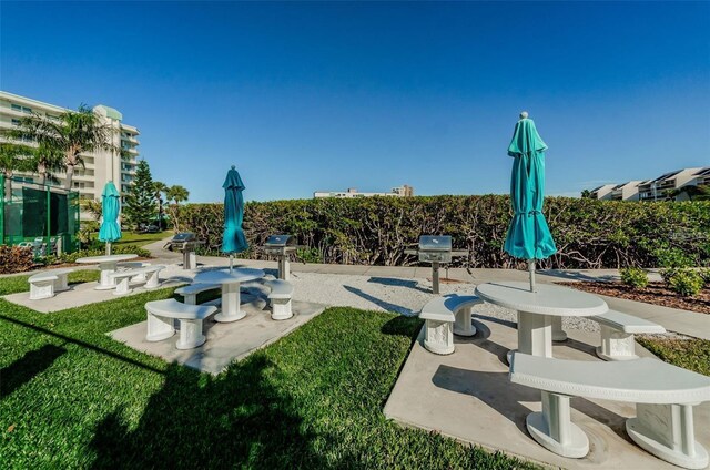 7932 Sailboat Key Blvd S Unit 406, South Pasadena, FL 33707 - surrounding community with a yard