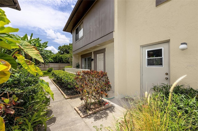 1881 Lichen Ln Unit B, Clearwater, FL 33760 - view of home's exterior with stucco siding