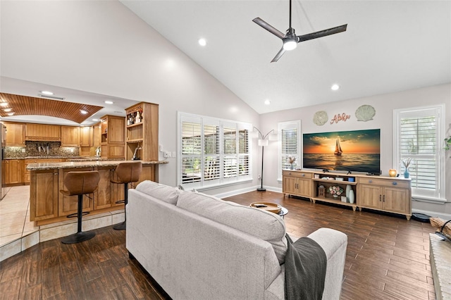2306 S Valrico Rd, Valrico, FL 33596 - living area featuring recessed lighting, high vaulted ceiling, a ceiling fan, plenty of natural light, and wood finished floors